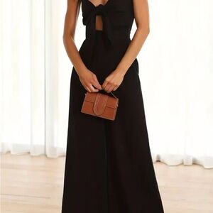 Elegant Black Jumpsuit with Tie front and stretchy back NWT